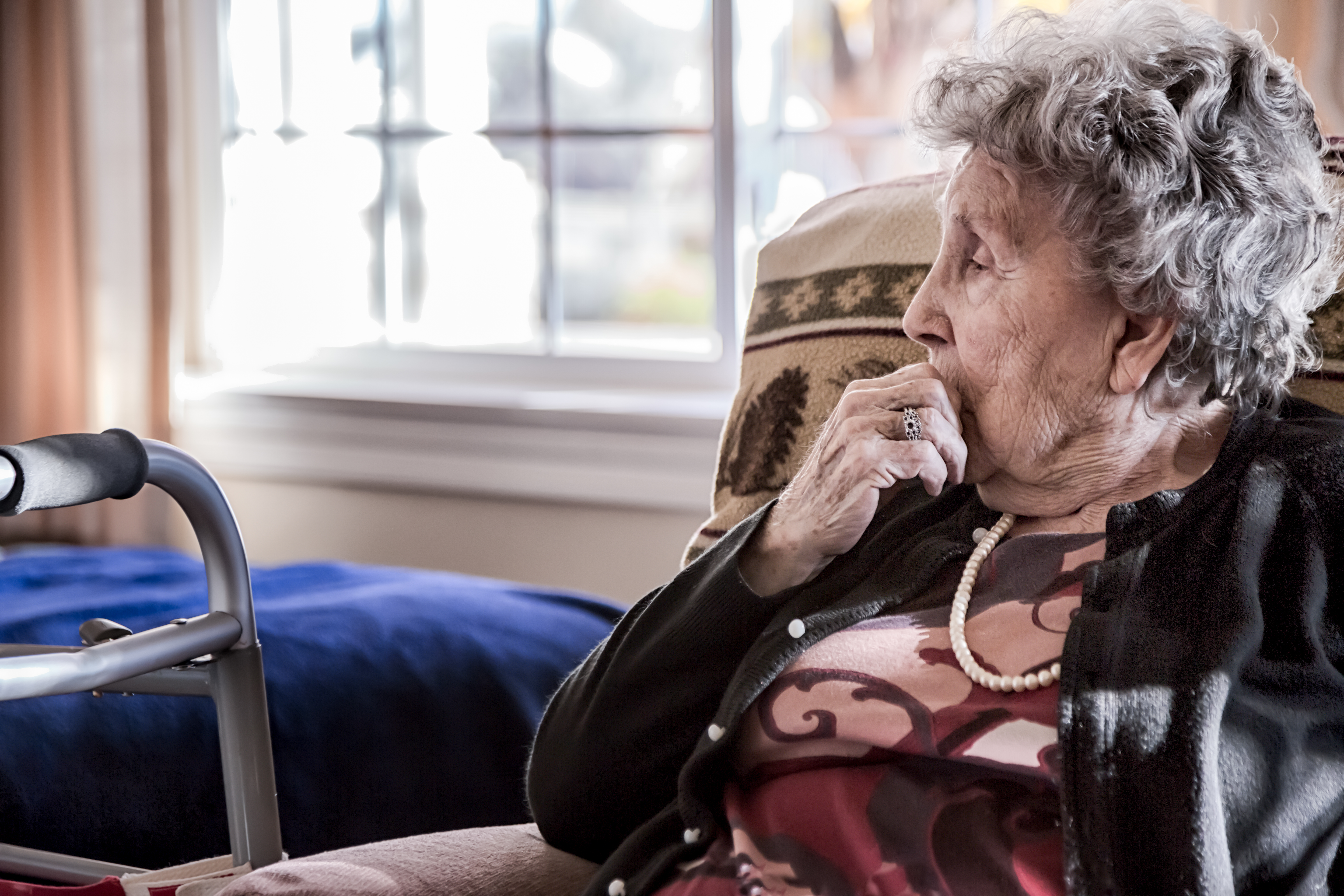 woman sitting in nursing home
